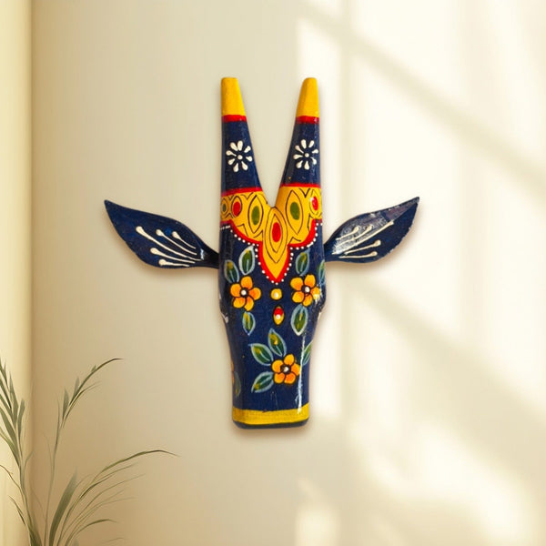 Black and Yellow Handcrafted Cow Figurine in Wood