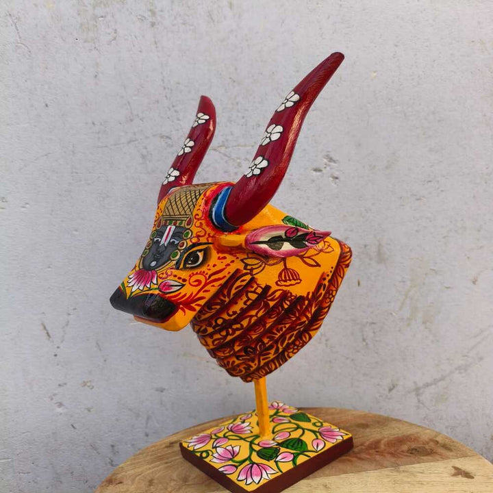 Wooden Cow in Sunlit Yellow and Brick Red