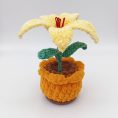 crochet-flower-in-pot-decorative-piece-8735522.jpg