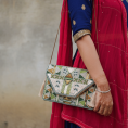 hand-embroidered-jute-sling-bag-with-geometric-floral-motifs-5237168.png