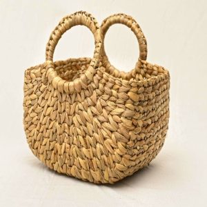 handcrafted-grass-basket-with-prominent-round-handles-1618716.jpg