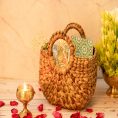 handcrafted-grass-basket-with-prominent-round-handles-4124874.jpg