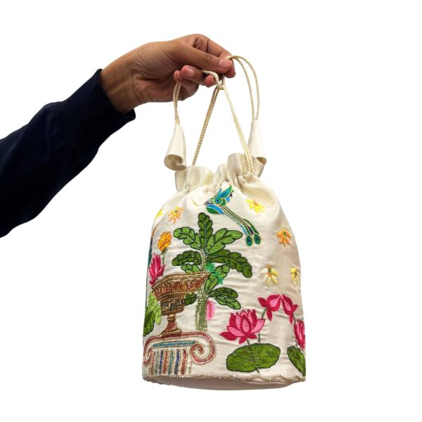 ivory-garden-banarasi-potli-bag-9332870.jpg ivory-garden-banarasi-potli-bag-9332870.jpg