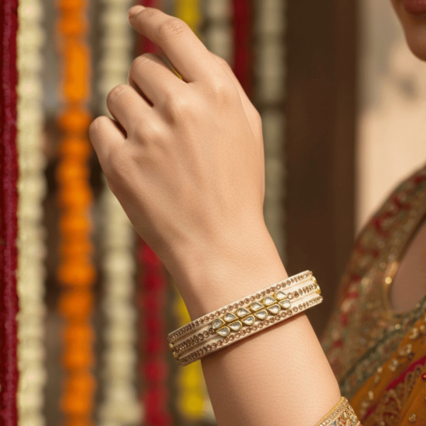ivory-kundan-lac-bangles-set-of-2-2477234.png ivory-kundan-lac-bangles-set-of-2-2477234.png
