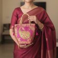 meher-banarasi-silk-potli-bag-8394746.jpg