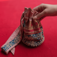rangriti-floral-embroidered-potli-bag-7584844.png