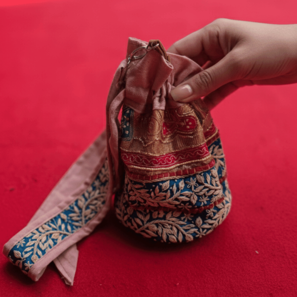 rangriti-floral-embroidered-potli-bag-7584844.png rangriti-floral-embroidered-potli-bag-7584844.png
