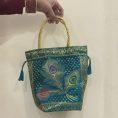 teal-peacock-feather-banarasi-potli-bag-8318122.jpg
